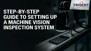 Engineer configuring a machine vision inspection system with cameras, lighting, and software tools.